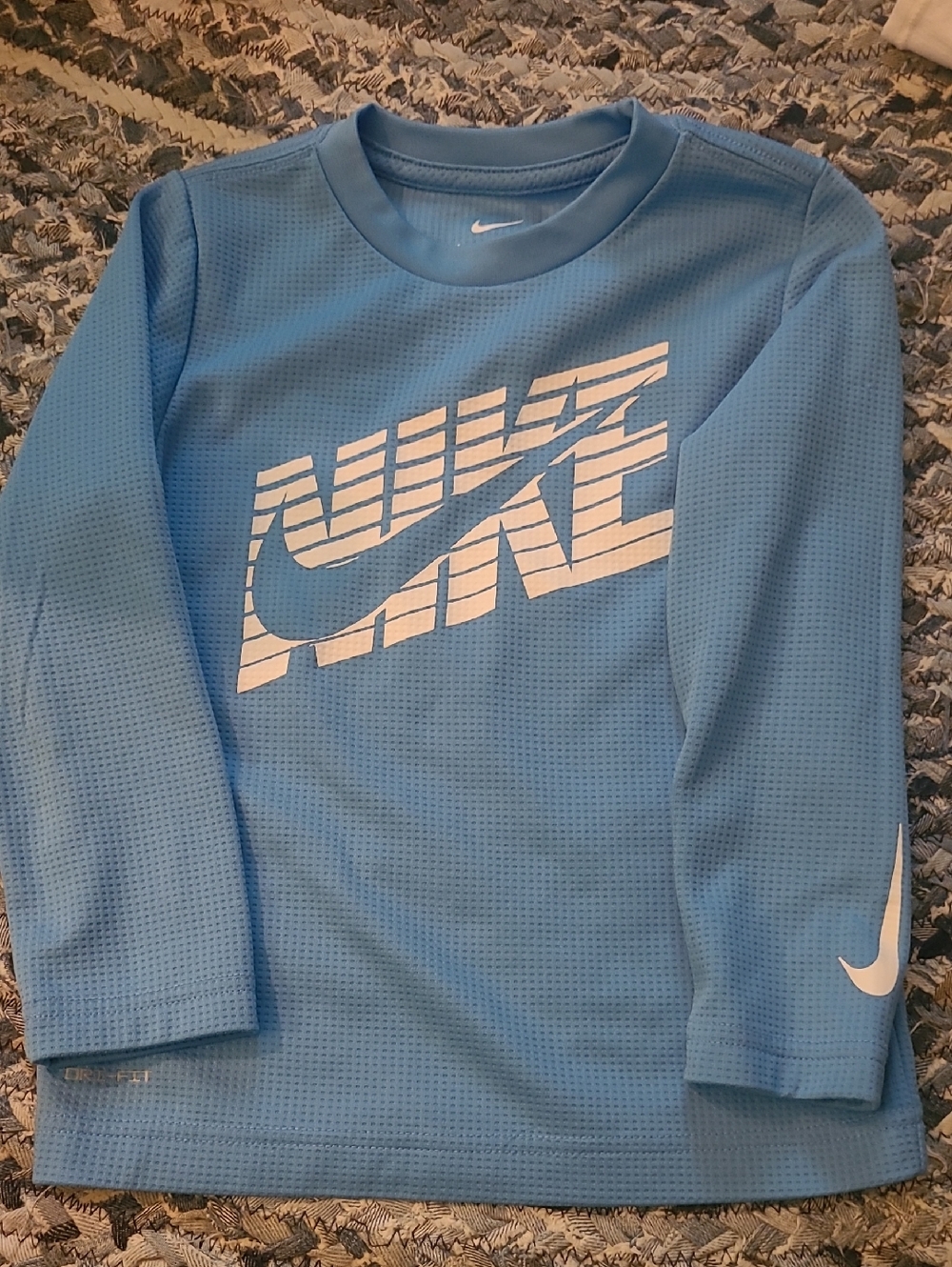 Nike Light Blue Long Sleeve Athletic Top with White Logo